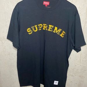 Black Supreme T shirt.